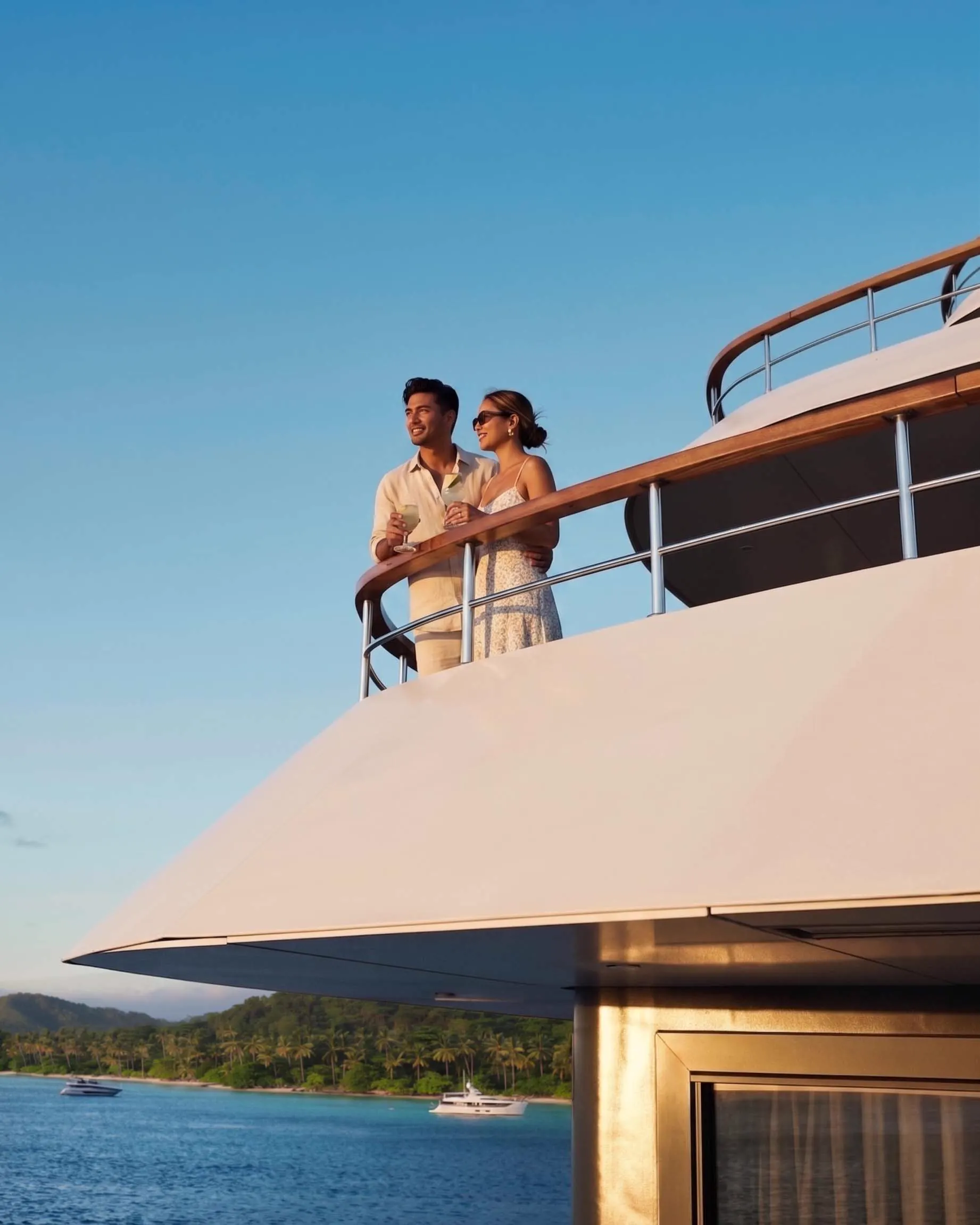 Couple enjoying a private yacht charter arranged by Charter.ph